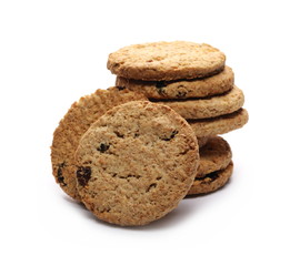 Round wholewheat biscuits, cookies with raisins isolated on white background