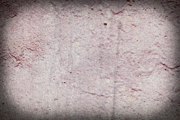 Old wall painted with pink paint as a background