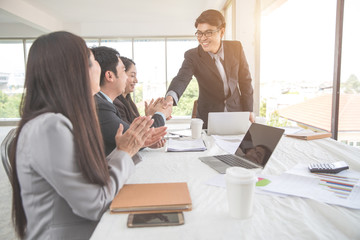businesspeople meeting and discussing with graph and chart and showing successful result using as background (concept of successful and achievement)