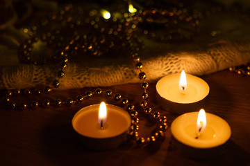 three lighted new year candles