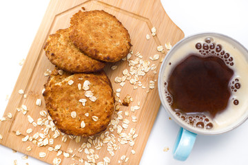 Oatmeal cookies cup of coffee.