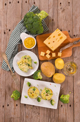 Potato gratins with broccoli florets.