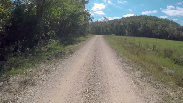 Drive plate on dirt road in Ozarks forest area in Missouri