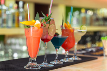 bar counter Cocktails drinks selection multicolored summer drinks