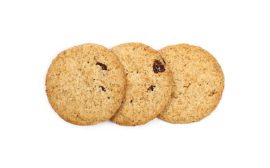 Round whole wheat biscuits, cookies with raisins isolated on white background, top view