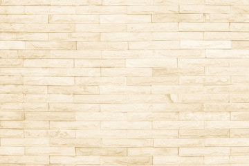 Seamless cream pattern of decorative brick sandstone wall surface with concrete of modern style design decorative uneven have cracked realmasonry wall of multicolored stones or blocks with cement.