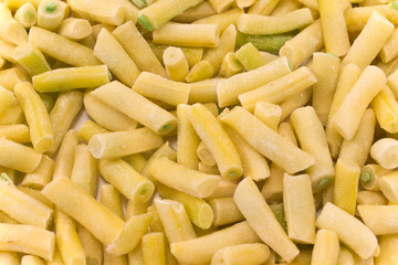 Yellow string beans vegetable pile as background