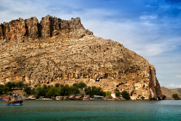Landscape of Rumkale  in the foreground Euphrates River. Halfeti and Rumkale are a touristic areas between Gaziantep and Sanliurfa in Turkey.