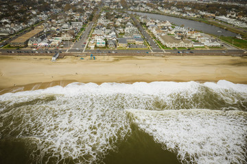 Aerial of Surfers in Big Waves in Belmar New Jersey