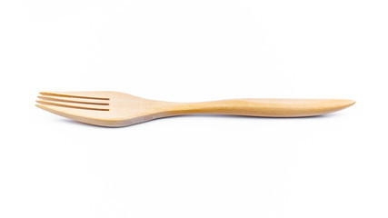 Only empty fork made of wood on white background. Top view. Isolated. Wooden.