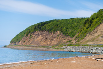 The beach on Sakhalin passes on the hills