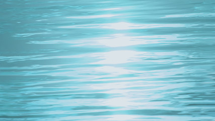 water surface with ripples and waves. sun glare. aquatic background. tinted