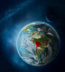 Obraz na płótnie Canvas Bolivia from space on Earth surrounded by space with Moon and Milky Way. Detailed planet surface with city lights and clouds.