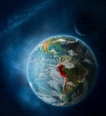Peru from space on Earth surrounded by space with Moon and Milky Way. Detailed planet surface with city lights and clouds.