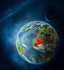 Mali from space on Earth surrounded by space with Moon and Milky Way. Detailed planet surface with city lights and clouds.