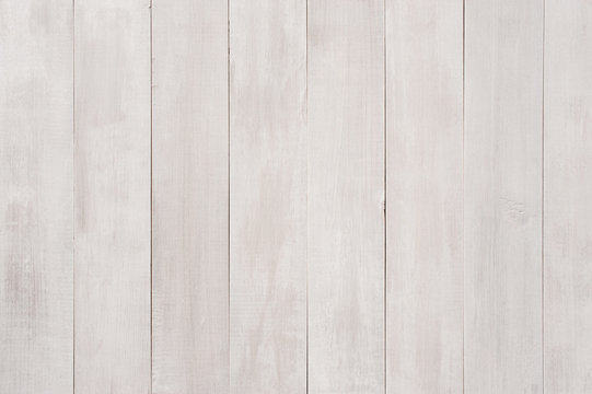 Light grey-beige background of textured boards