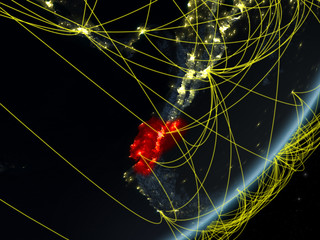 Ecuador on model of planet Earth with network at night. Concept of new technology, communication and travel.