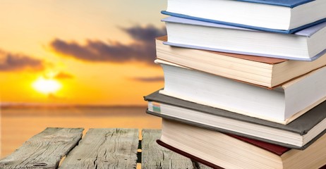 Collection of old books  on background