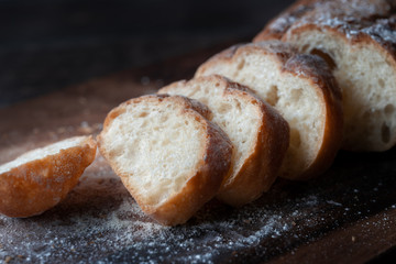 Close up of bread on wooden floor