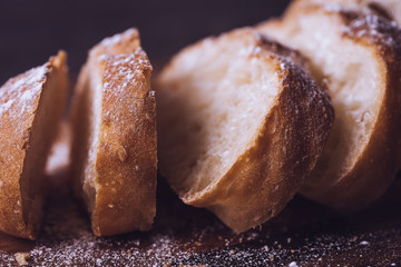 Close up of bread on wooden floor