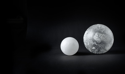 Two spheres covered with frosty pattern.