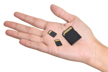 micro sd cards in hand isolated on white background