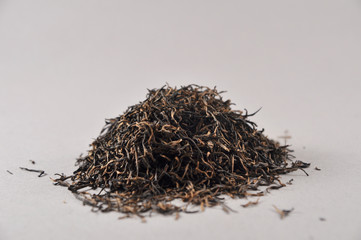 Chinese black tea and Infusions. Heap of dry tea leaf.