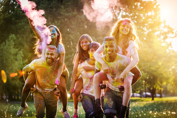 Friends playing with holi powder