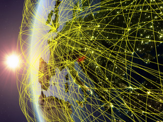 Slovenia from space on model of Earth during sunset with international network. Concept of digital communication or travel.