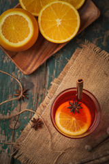Christmas mulled wine on a rustic wooden table. Holidays concept.