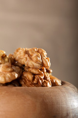 Close up of walnuts in a wooden bowl