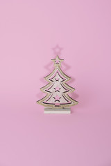 Christmas tree over light blue background.