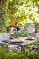 Table for two in the garden of a restaurant