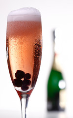 Kir royal cocktail with blueberries