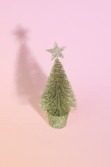 Christmas tree over light blue background.