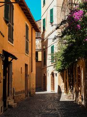 Obraz premium Sunny italian street in a small town, Nettuno, Italy, Europe