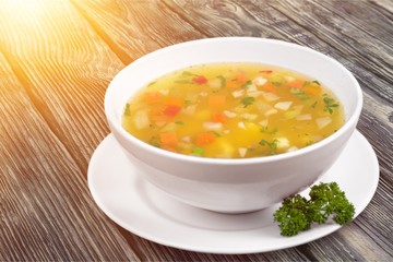 Bowl of vegetables delicious soup, close-up view