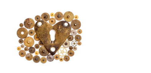 Love heart steampunk machinery ornament on white. Aged bronze keyhole heart shape with many textured cogs gears wheels. Retro style mechanical technology concept. Copy space