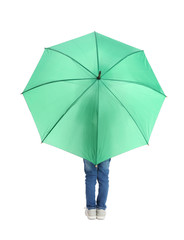 Little boy with green umbrella on white background