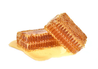 Yellow Honeycomb slice closeup isolated on white background