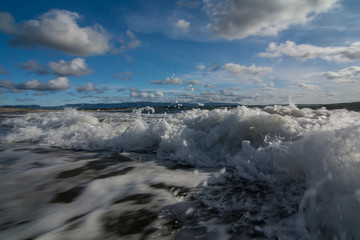 Waves crashing on an empty beach in Newfoundland