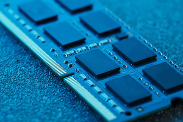 Electronic circuit board close up. Processor, chips and capacitors.