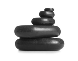 Stack of spa stones on white background