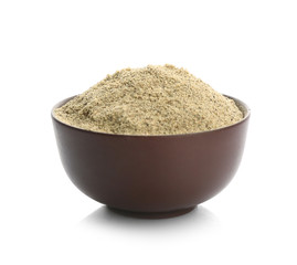 Bowl with pepper powder on white background