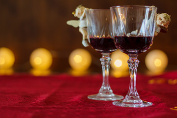 Two glasses of red wine with Christmas decoration