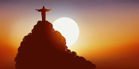 Fotobehang Coucher de soleil sur le Corcovado, célèbre monument brésilien au dessus de la baie de Rio de Janeiro.  © pict rider