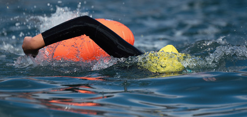 Long distance swimming marathon swimmer in action