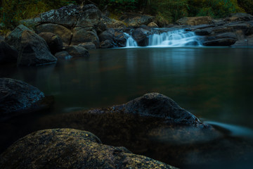 small pond with waterfall