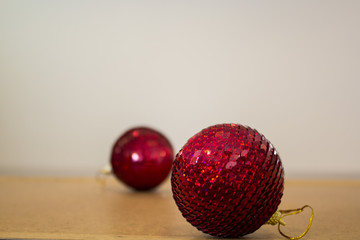 two red christmas balls on white background