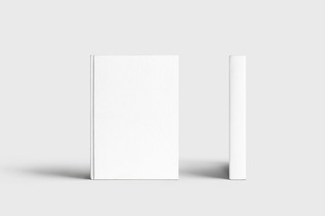 Closed books with blank white cover. Mock-up magazine or brochure isolated on soft gray background.3d render.